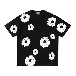 a black shirt with white flowers on a white background